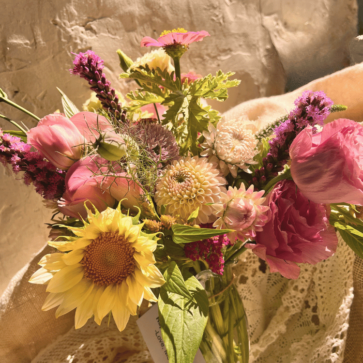 white sunflower and pink lisianthus locally grown arrangement